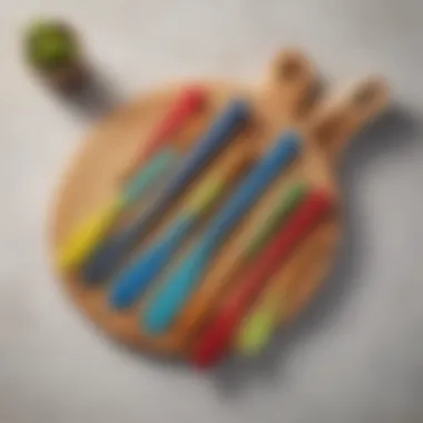 An array of colorful small rubber spatulas in various sizes displayed on a kitchen counter.