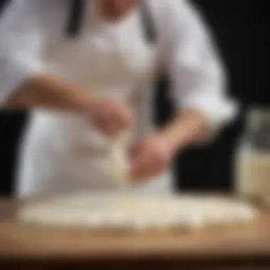 An artisanal cheese maker showcasing the mozzarella stretching technique