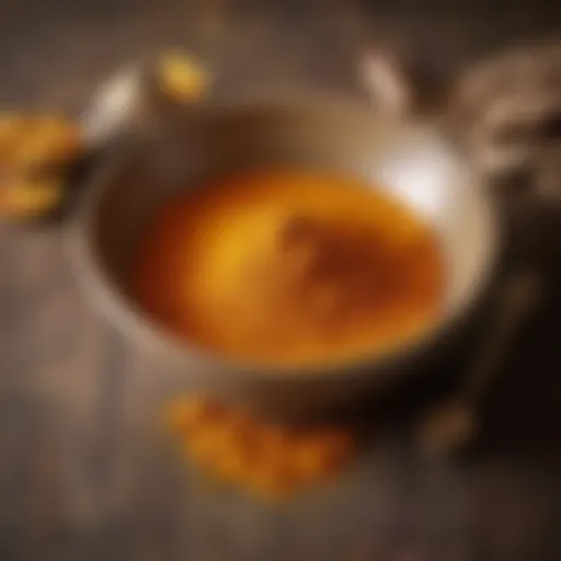 Vibrant turmeric powder in a rustic bowl