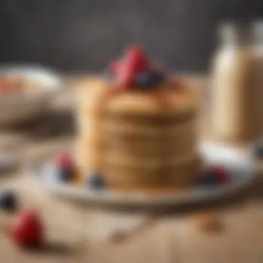 A stack of fluffy pancakes made with oat flour and topped with almond butter and fruit