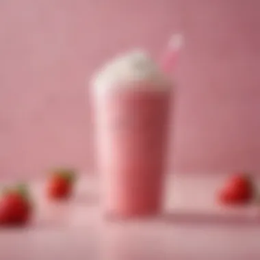 A refreshing Venti Pink Drink garnished with fresh strawberries and coconut flakes