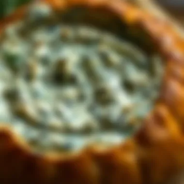Texture of Warm Spinach Dip A close-up view of the creamy texture of warm spinach dip, invitingly served in bread.