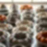 A collection of mini bundt pans in various materials and sizes