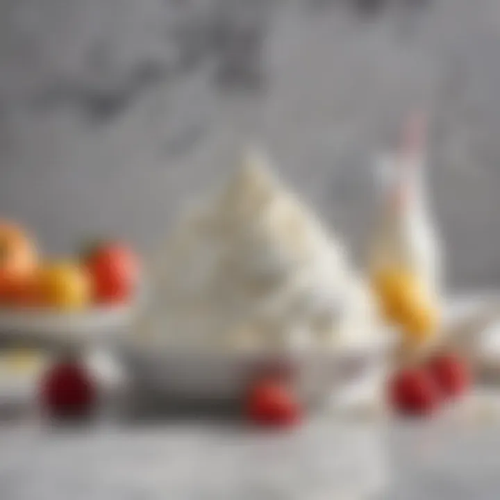 An array of ingredients including cream, sugar, and vanilla on a marble countertop.